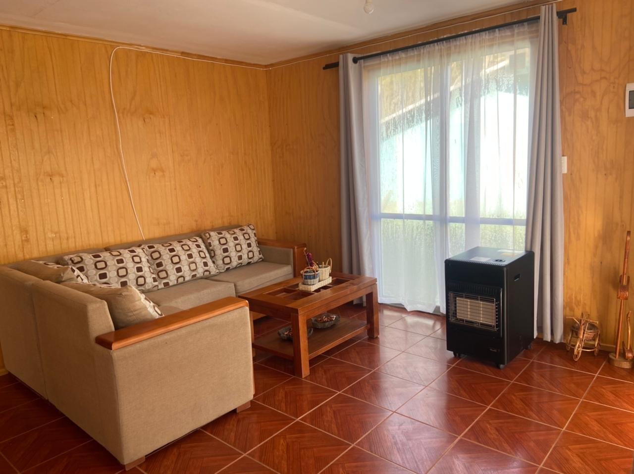 Living de la cabaña